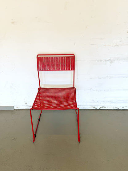 Chaise rouge en métal années 80