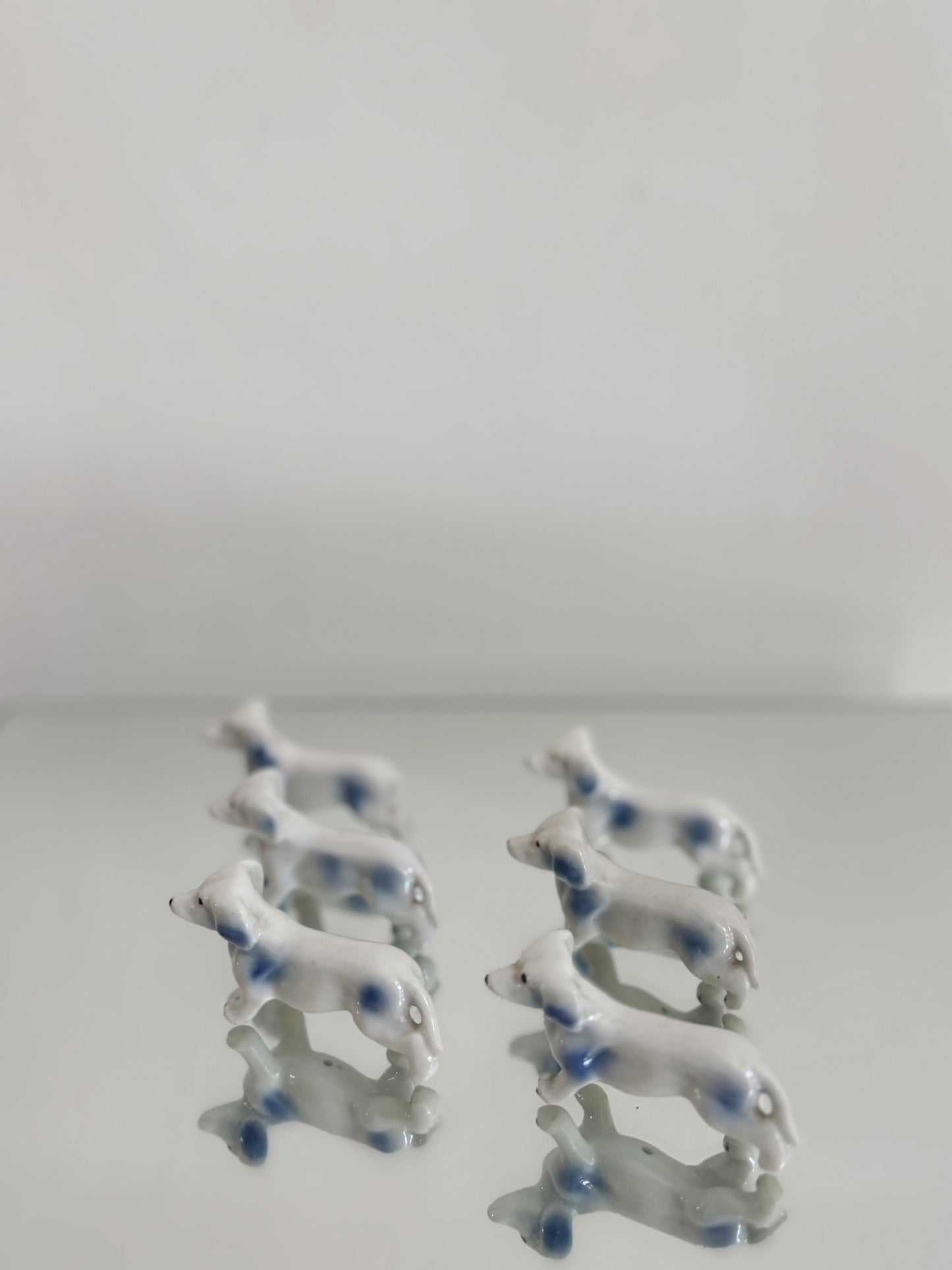 Ensemble de portes couteaux chien en porcelaine