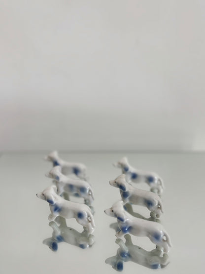 Ensemble de portes couteaux chien en porcelaine