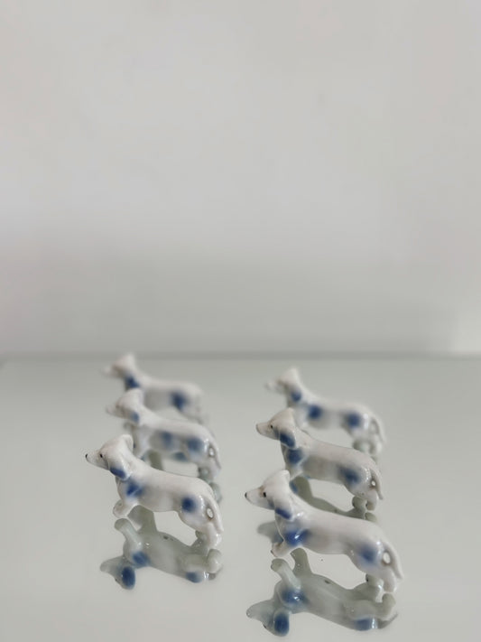 Ensemble de portes couteaux chien en porcelaine
