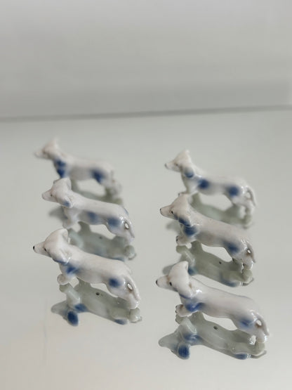 Ensemble de portes couteaux chien en porcelaine