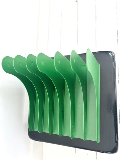Grass green plastic record holder Schweizer Design